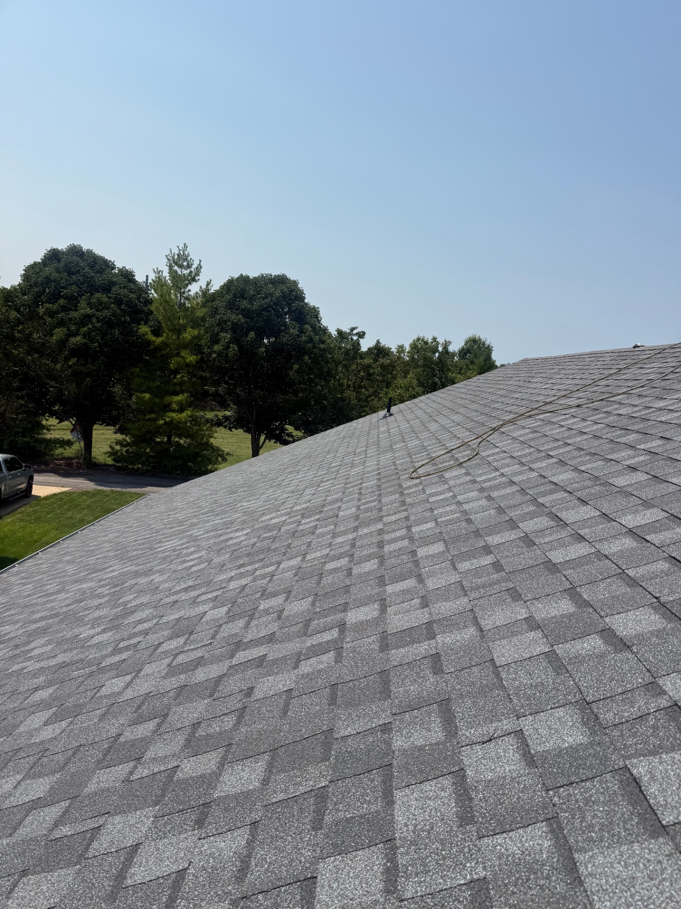 Straight ridge lines on a newly completed residential shingle roof